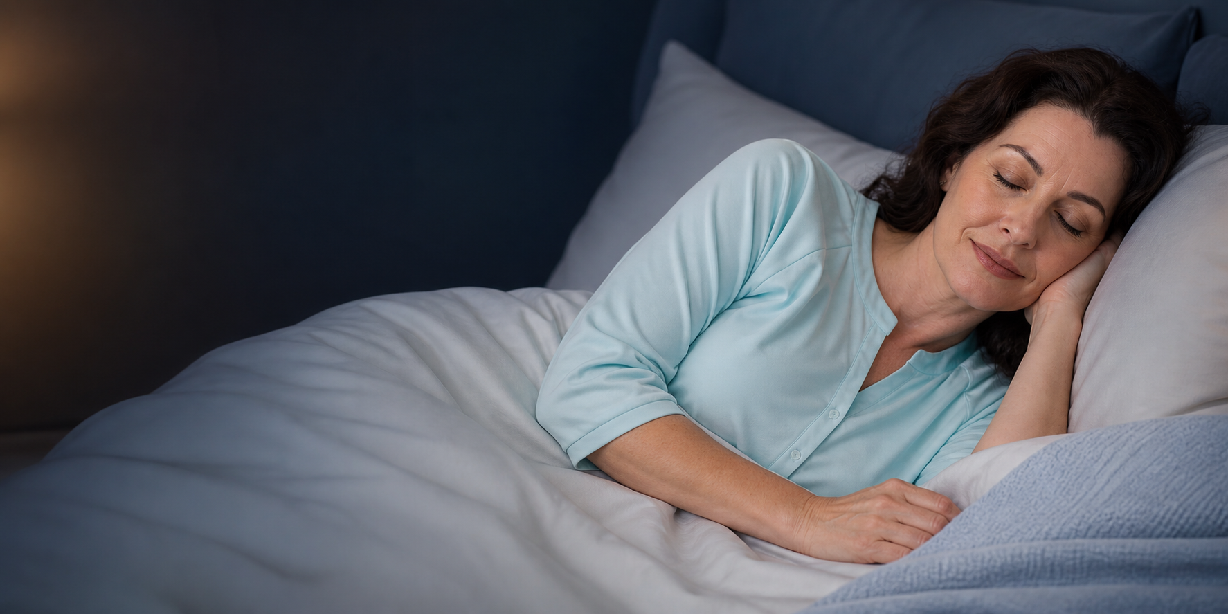 Woman sleeping comfortably in Whisp sleepwear