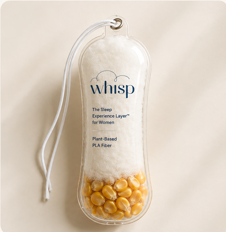 Whisp plant-based PLA fiber sample displayed with corn